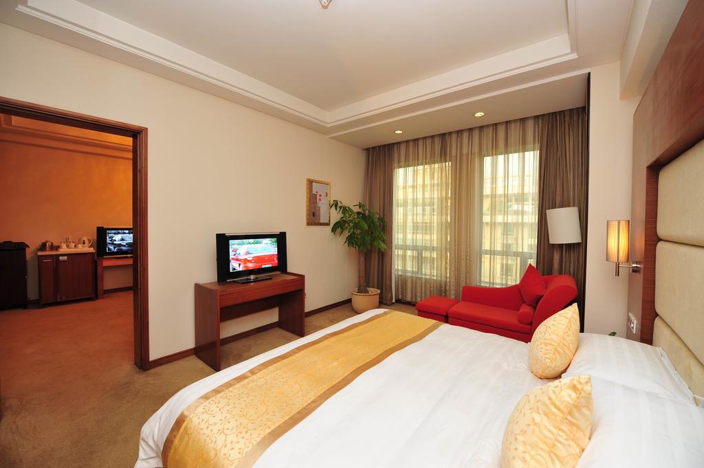 Hotel Ramada Plaza Cantón Habitación foto