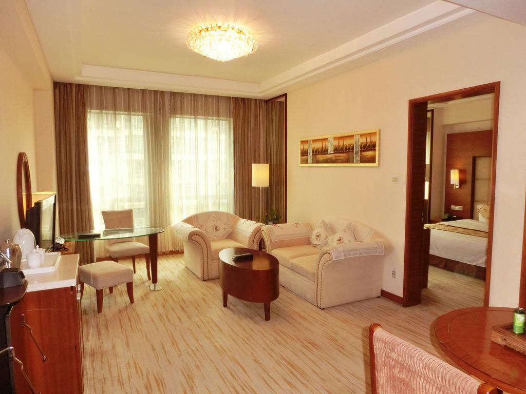 Hotel Ramada Plaza Cantón Habitación foto