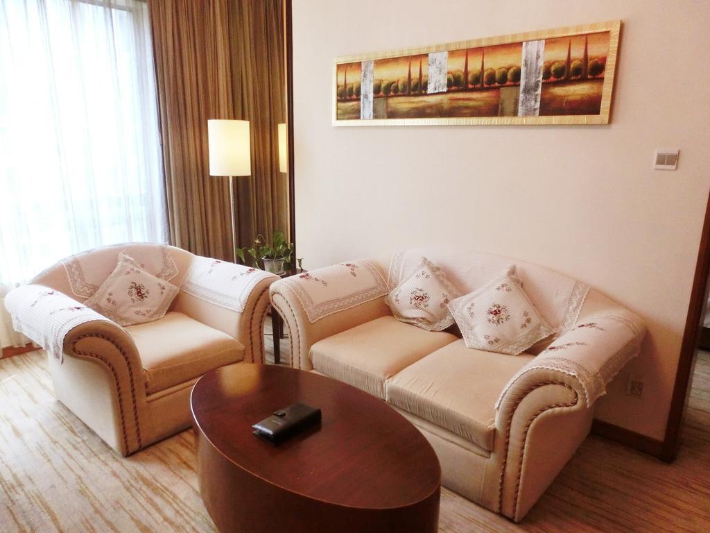 Hotel Ramada Plaza Cantón Habitación foto