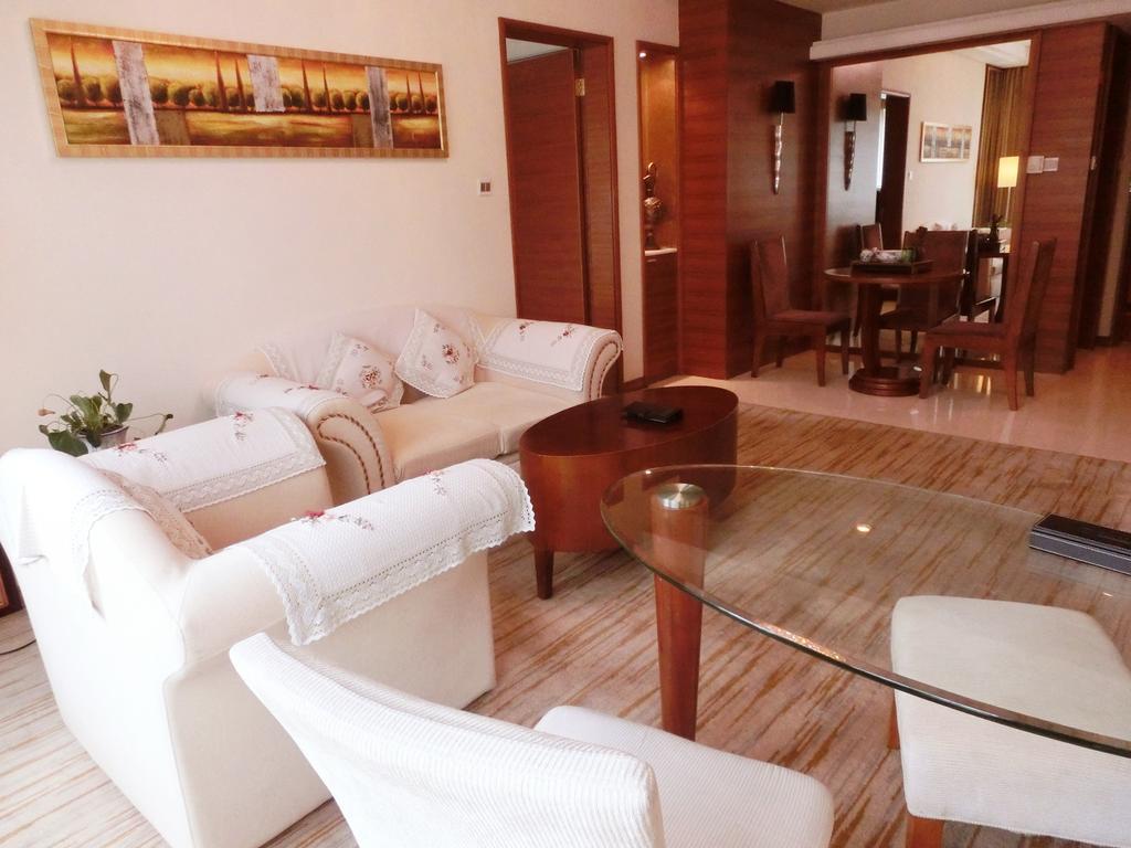 Hotel Ramada Plaza Cantón Habitación foto